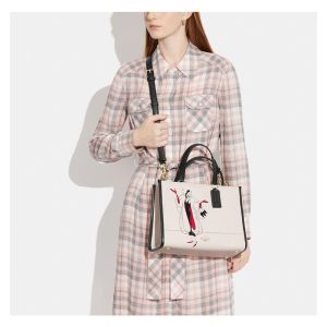 Coach Dempsey Carryall in Pebble Leather with Disney Cruella Motif Beige